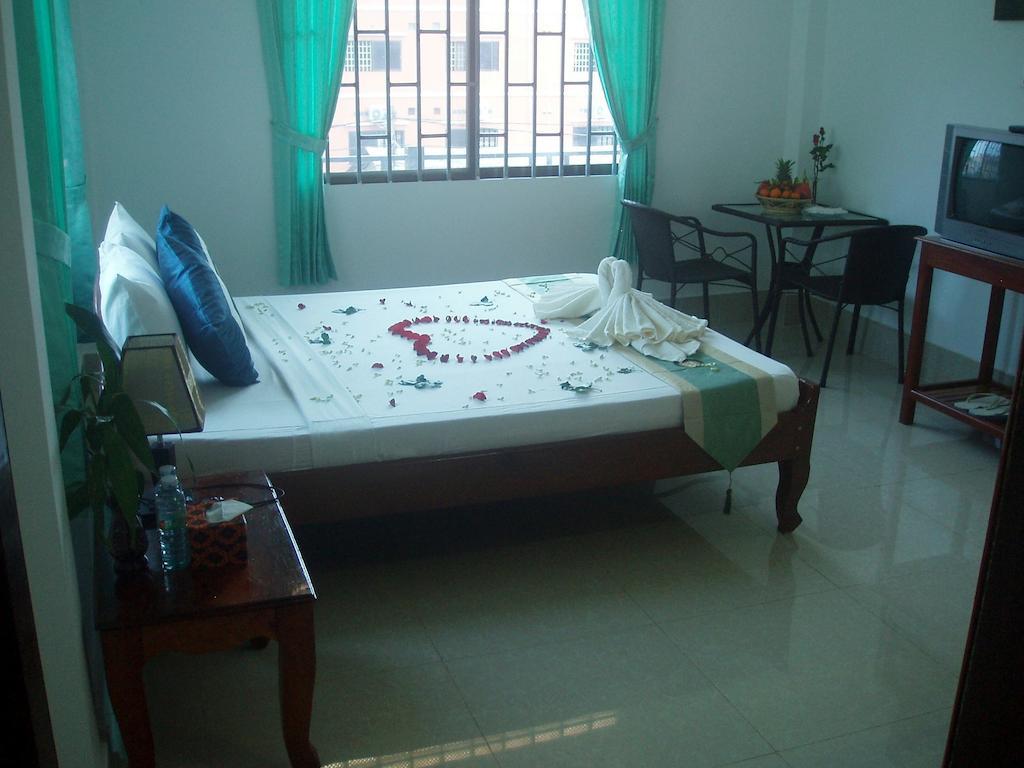 Schein Guesthouse & Restaurant Ciudad de Siem Riep Habitación foto