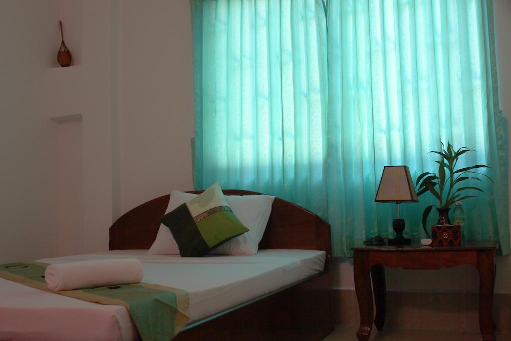 Schein Guesthouse & Restaurant Ciudad de Siem Riep Habitación foto