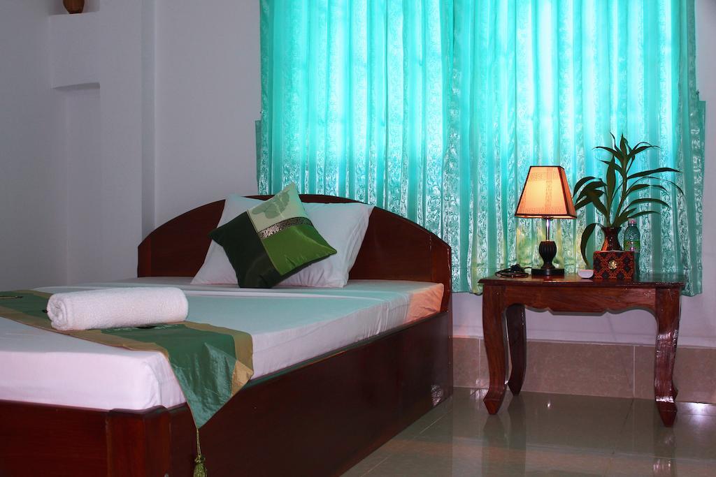 Schein Guesthouse & Restaurant Ciudad de Siem Riep Habitación foto