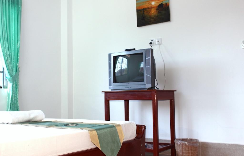 Schein Guesthouse & Restaurant Ciudad de Siem Riep Habitación foto