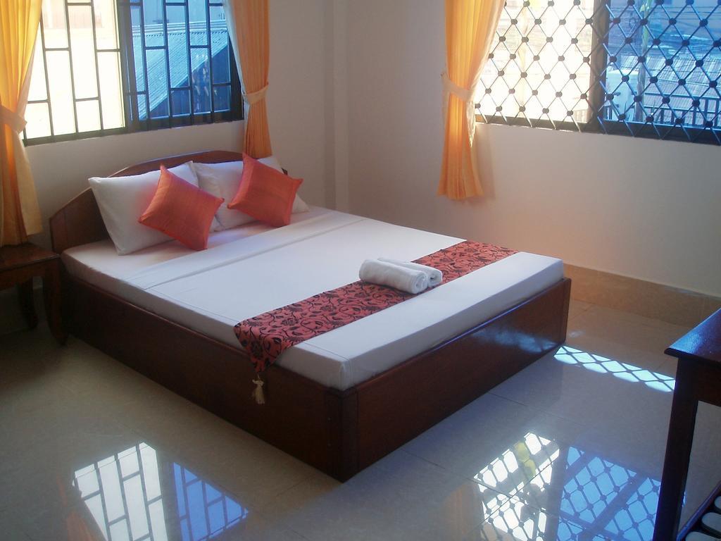 Schein Guesthouse & Restaurant Ciudad de Siem Riep Habitación foto